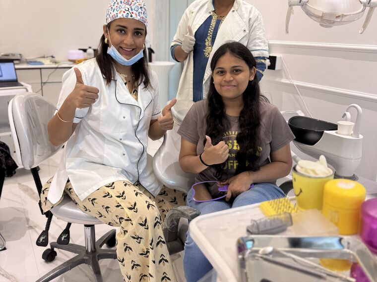 Patient smiling after dental treatment